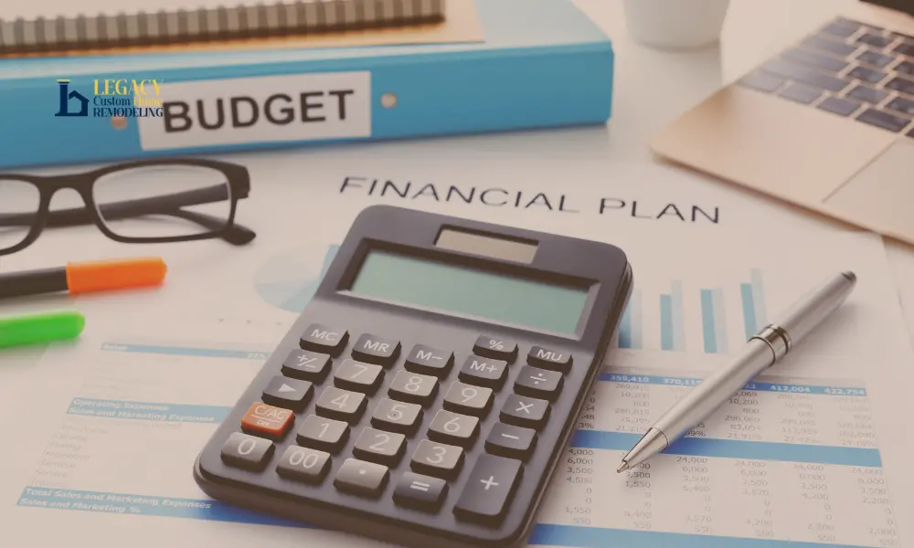 Calculator and financial plan worksheet on a desk for full home remodel budgeting and planning checklist